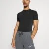 Odlo PERFORMANCE WARM ECO CREW NECK - Unterhemd/-shirt - Black/new Graphite Grey