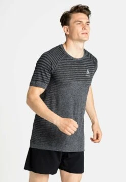 Odlo CREW NECK ESSENTIAL SEAMLESS - Sport T-shirt - Blue Wing Teal Melange -Odlo 947f429983084a5593078fcb3c971de8